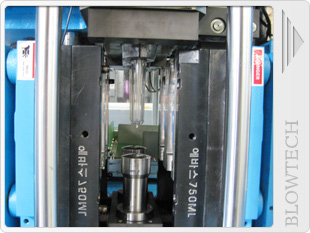 Paso-4: Transferencia a soplado de moldes de preformas.